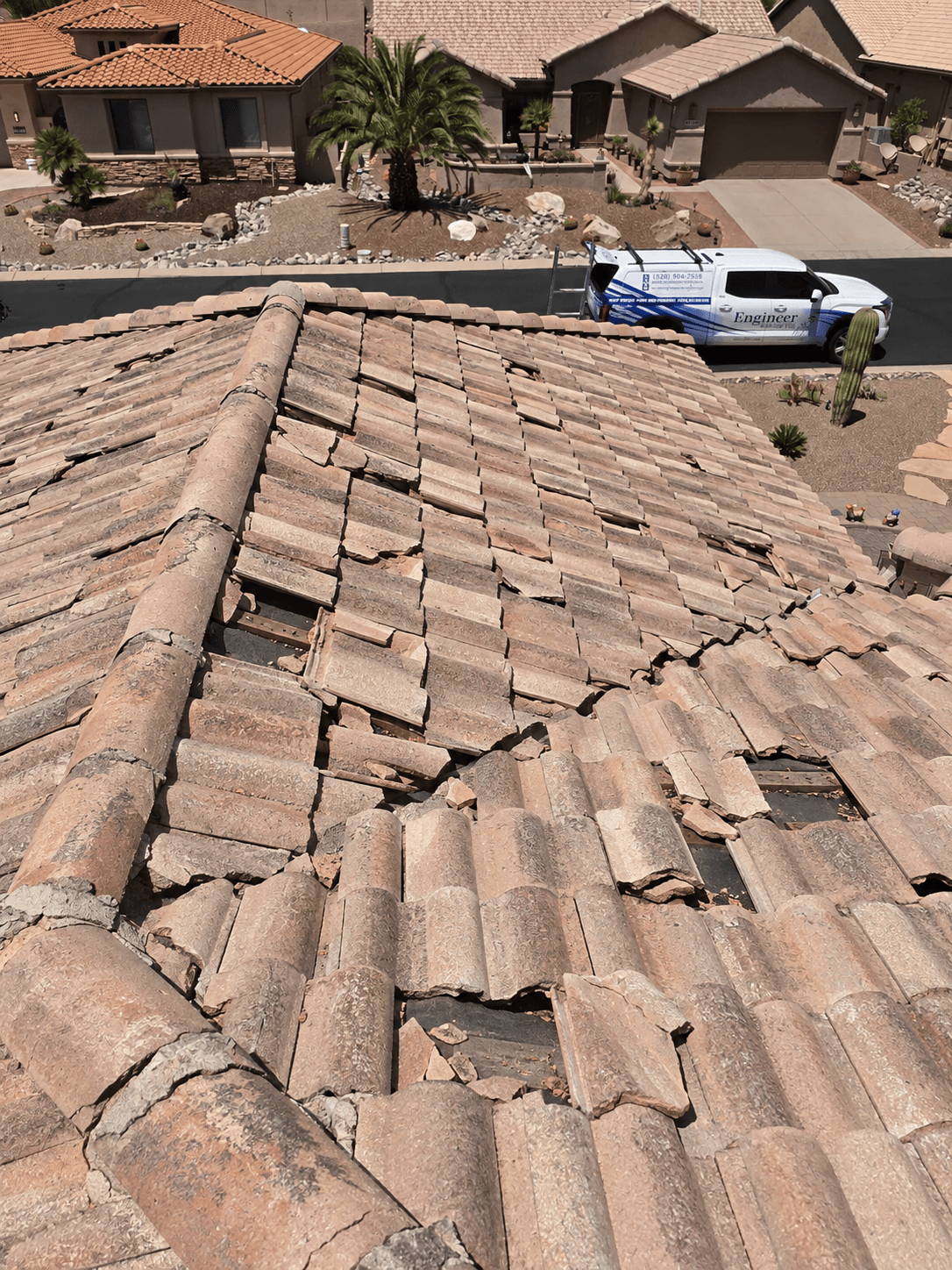 Illustrative damaged residential tile roof before restoration
